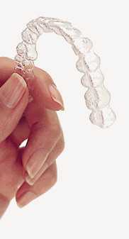 hand holding invisalign